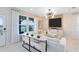 Stylish living room featuring lots of natural light and console table at 11328 Blue Bay Dr, Orlando, FL 32832