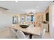 Open-concept living area featuring dining area and bright, airy atmosphere at 11328 Blue Bay Dr, Orlando, FL 32832