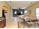 Open-concept living space combines dining and living areas, offering a spacious and inviting atmosphere at 11994 Mckinnon Rd, Windermere, FL 34786