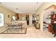 Open-concept living space with a dining area, kitchen, and built-in office nook at 11994 Mckinnon Rd, Windermere, FL 34786