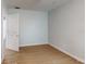 Bright bedroom with light wood floors and a door with butterfly decorations at 12381 Antonio Cir, Orlando, FL 32826