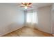 Bedroom features light wood floors, ceiling fan and a bright window at 12381 Antonio Cir, Orlando, FL 32826