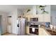 Well-lit kitchen with stainless steel appliances, plenty of cabinets, and a decorative fish theme at 12381 Antonio Cir, Orlando, FL 32826