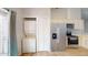 Bright kitchen features modern, stainless steel appliances and a convenient washer and dryer at 12381 Antonio Cir, Orlando, FL 32826