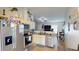 Updated kitchen features stainless appliances, granite countertops and ample cabinet space at 12381 Antonio Cir, Orlando, FL 32826