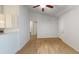 Open concept living room has modern tile floors, access to the kitchen, and a storage closet at 12381 Antonio Cir, Orlando, FL 32826