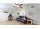 Comfortable living room with wood-look flooring and a ceiling fan at 12381 Antonio Cir, Orlando, FL 32826