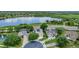 Aerial view of the home in context to the community and a nearby lake at 12411 Scarlett Sage Ct, Winter Garden, FL 34787