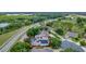 Aerial view of the home highlighting the backyard pool, patio, and roof solar panels at 12411 Scarlett Sage Ct, Winter Garden, FL 34787
