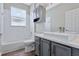 Bathroom with a sink, toilet, and bathtub at 12411 Scarlett Sage Ct, Winter Garden, FL 34787