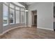 Charming breakfast nook with abundant natural light, hardwood floors, and views of the pool at 12411 Scarlett Sage Ct, Winter Garden, FL 34787