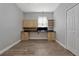 An office with cabinets, storage, and wood-look floors at 12411 Scarlett Sage Ct, Winter Garden, FL 34787