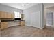 An office with cabinets, storage, and wood-look floors at 12411 Scarlett Sage Ct, Winter Garden, FL 34787