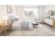 Spacious bedroom features a serene atmosphere and ample natural light at 12536 Westhaven Oak Dr # 111, Winter Garden, FL 34787