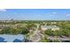 Stunning aerial view showcasing the lush landscaping, vibrant community, and overall charm of the property at 13415 Blue Heron Beach Dr # 710, Orlando, FL 32821