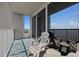 Relax on this private balcony, perfect for enjoying the fresh air and serene views from this condo at 13415 Blue Heron Beach Dr # 710, Orlando, FL 32821
