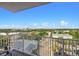 Breathtaking balcony view of lush landscaping and the city skyline from a high-rise building at 13415 Blue Heron Beach Dr # 710, Orlando, FL 32821