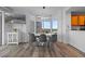 Contemporary dining area with scenic views through large windows, stylish lighting and comfortable seating at 13415 Blue Heron Beach Dr # 710, Orlando, FL 32821