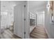 Hallway leading to a bunk bed room and a full bathroom with shower at 13415 Blue Heron Beach Dr # 710, Orlando, FL 32821