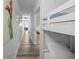 Hallway featuring a bunk bed and modern art decor at 13415 Blue Heron Beach Dr # 710, Orlando, FL 32821