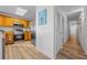 Compact kitchen featuring wood cabinets and stainless steel appliances at 13415 Blue Heron Beach Dr # 710, Orlando, FL 32821