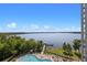 Enjoy the expansive lake and pool views from the condo balcony at 13415 Blue Heron Beach Dr # 710, Orlando, FL 32821