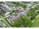An aerial view of the community showcasing the home's proximity to neighboring residences at 14526 Chicora Crossing Blvd, Orlando, FL 32828