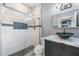 Modern bathroom with tiled shower, glass doors, mosaic accents, vessel sink and vanity at 14526 Chicora Crossing Blvd, Orlando, FL 32828