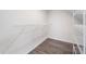 A walk-in closet with wood-look floors and wire shelving offers ample storage space at 14526 Chicora Crossing Blvd, Orlando, FL 32828