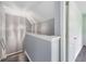 Upstairs hallway with modern lighting, fresh paint, and access to multiple rooms at 14526 Chicora Crossing Blvd, Orlando, FL 32828