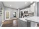 Modern kitchen with stainless steel appliances and white cabinets at 14526 Chicora Crossing Blvd, Orlando, FL 32828