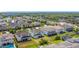 Aerial view of the neighborhood showcasing lush landscaping and well-maintained homes at 14962 Fells Ln, Orlando, FL 32827