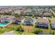 Expansive backyard and manicured lawn with covered patio, perfect for outdoor living and entertaining at 14962 Fells Ln, Orlando, FL 32827