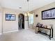 The dining area showcases an open floor plan with views to the kitchen, perfect for entertaining at 14962 Fells Ln, Orlando, FL 32827
