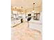 Bright and spacious kitchen featuring white cabinets and stainless steel appliances at 16041 Lagoon Dr, Clermont, FL 34711