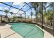 Relaxing screened-in pool area with plenty of room for lounging and enjoying the beautiful backyard views at 219 Old Mill Cir, Kissimmee, FL 34746