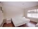 Simple bedroom with hardwood floors and natural light at 2208 Antigua Pl # 932, Kissimmee, FL 34741