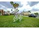 Well-manicured lawn and planted bike in front of apartment complex at 2208 Antigua Pl # 932, Kissimmee, FL 34741