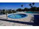 Inviting hot tub area with nearby lounge chairs, perfect for relaxation and socializing at 2208 Antigua Pl # 932, Kissimmee, FL 34741