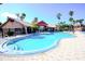 Large outdoor pool with palm trees and sun loungers, ideal for enjoying sunny days at 2208 Antigua Pl # 932, Kissimmee, FL 34741