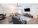 Comfortable living room with a large TV and plenty of space for entertaining at 2226 Majestic Span Ave, Eagle Lake, FL 33839