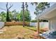 View of the spacious backyard from under the covered porch at 2714 Hunt Club Ln, Orlando, FL 32826