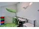 Bedroom with a custom wall decor and a long wall-mounted desk at 2714 Hunt Club Ln, Orlando, FL 32826