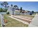 Charming two-story home with fresh landscaping, unique driveway, and convenient parking in a vibrant community at 2714 Hunt Club Ln, Orlando, FL 32826