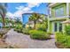 Well-maintained gravel backyard with lush greenery, perfect for outdoor entertaining and relaxation with room to roam at 3013 Latitude Ln, Kissimmee, FL 34747