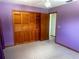 Bedroom features a spacious closet, light carpeting, and a ceiling fan for added comfort at 3123 Tamarind Dr, Edgewater, FL 32141