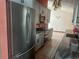 Kitchen with gray cabinets, stainless steel appliances, granite counters, and tile flooring at 3123 Tamarind Dr, Edgewater, FL 32141