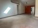 Open-concept living room with lots of light and access to other parts of the home at 3123 Tamarind Dr, Edgewater, FL 32141
