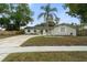 Charming home with a well-maintained lawn and inviting curb appeal at 3520 Balsam Dr, Winter Park, FL 32792