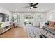 Inviting living room with seamless access to outdoor patio through sliding glass doors at 3520 Balsam Dr, Winter Park, FL 32792